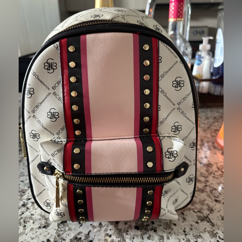 BCBG Women's Multi Color Backpack. Excellent condition.